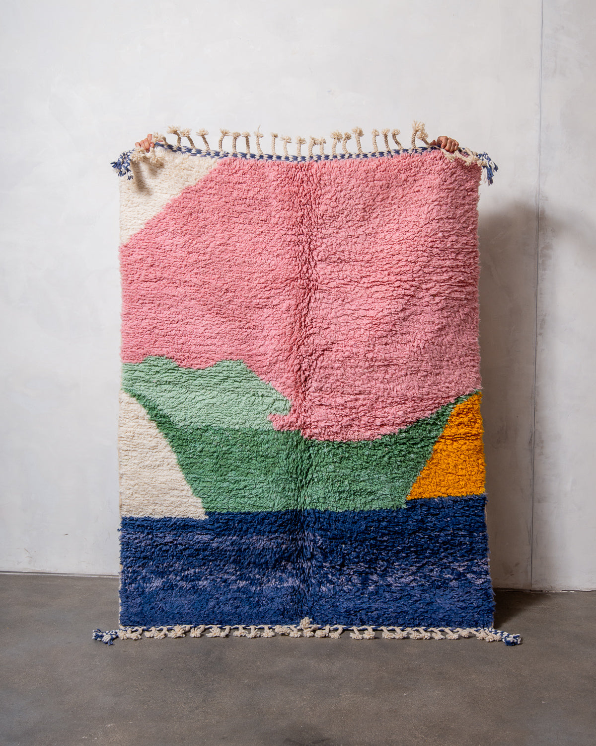 Modern, designer, handcrafted Berber rug from Morocco. Beniourain carpet with beautiful colours and patterns and fluffy wool texture.